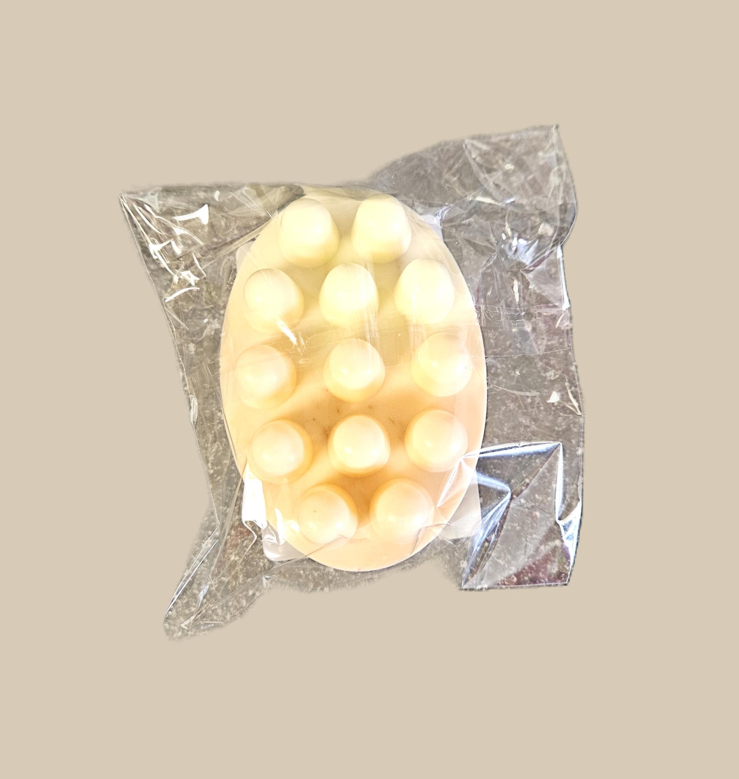 Savon de massage avec luffa.