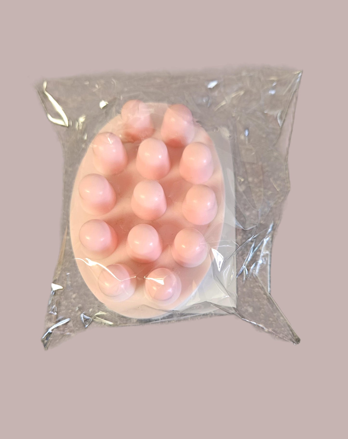 Savon de massage avec luffa.